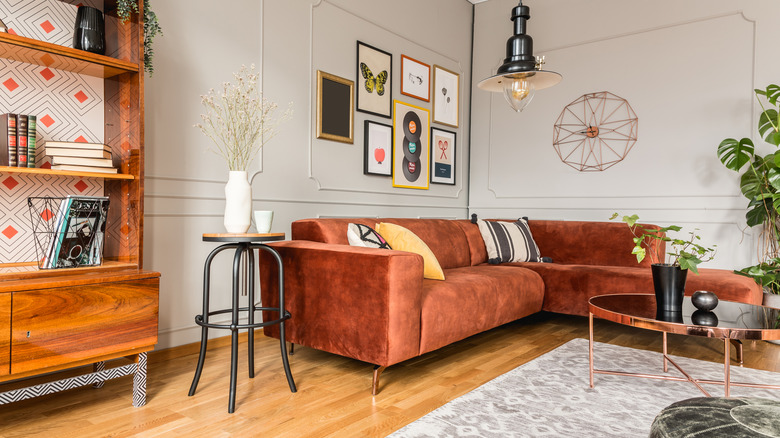 Living room with mix of mid-century, bohemian, and industrial elements