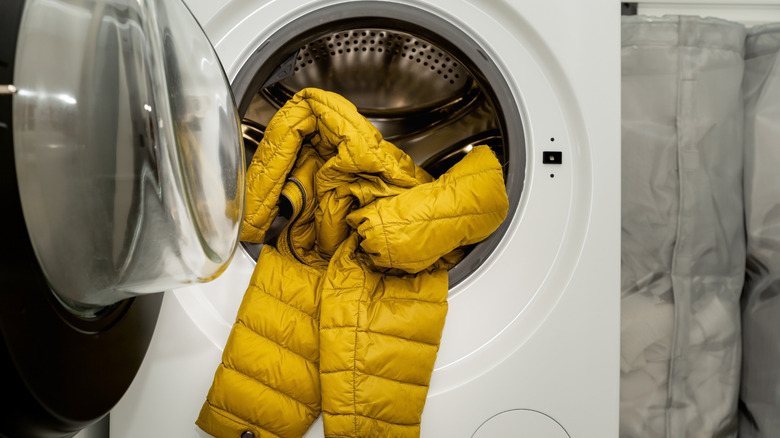 Yellow puffer jacket in washing machine