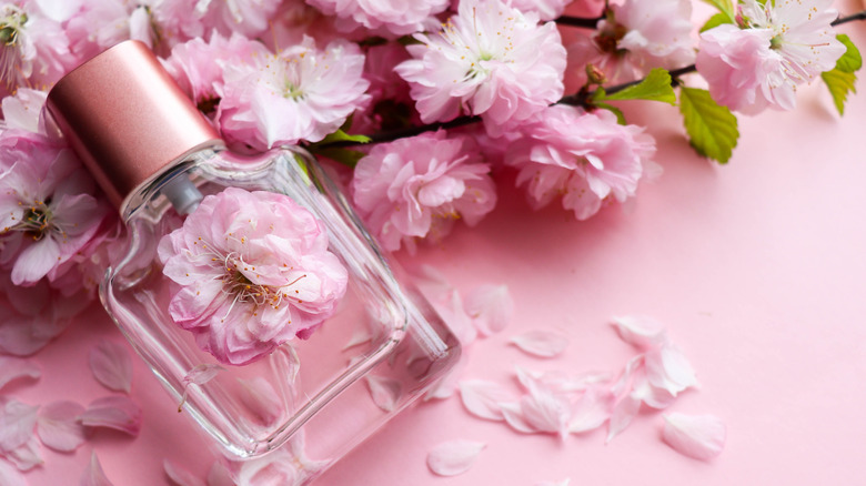 Perfume and rose petals