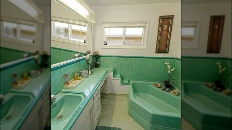 green bathroom with weird stairs 