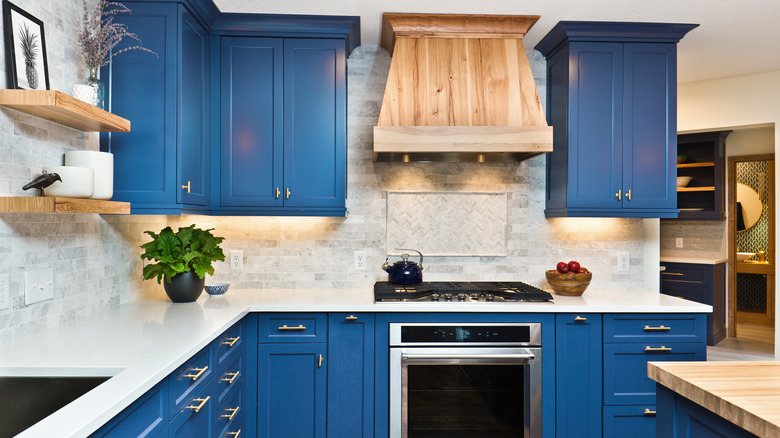 blue cabinets and wood tones