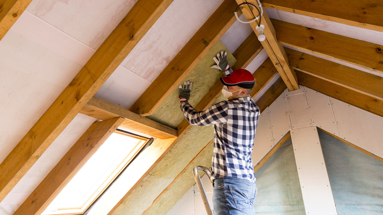 Man renovating ceiling