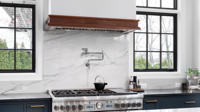 Farmhouse kitchen with marble backsplash