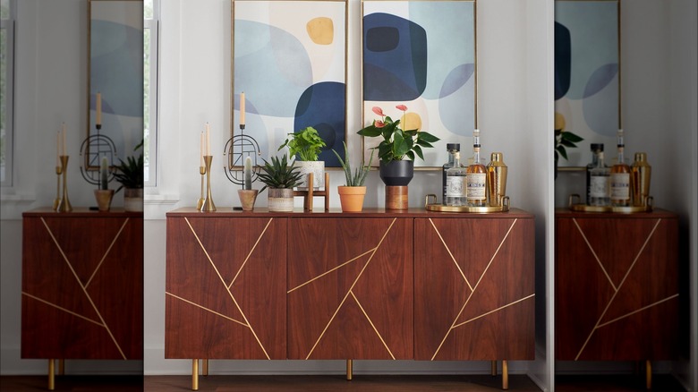 wood and brass side board