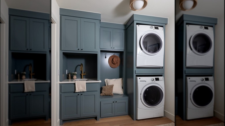Laundry room with paneled cabinets