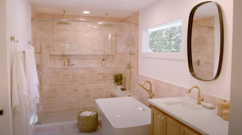 bathtub with pink tile