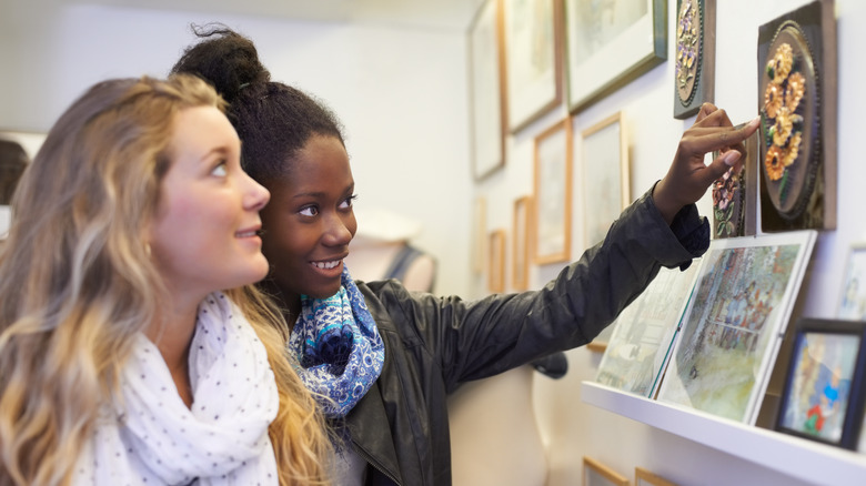 Women looking at art