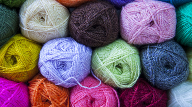 A stack of yarn in a variety of colors