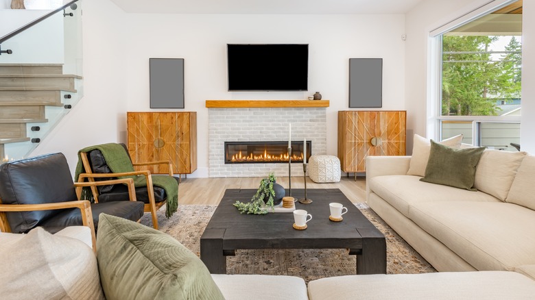 Living room with sectional sofa and fireplace 
