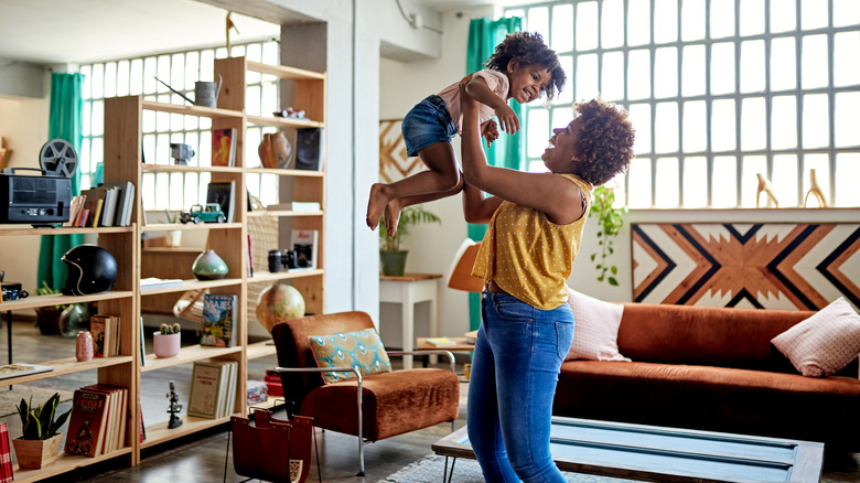 Mother and child in living room