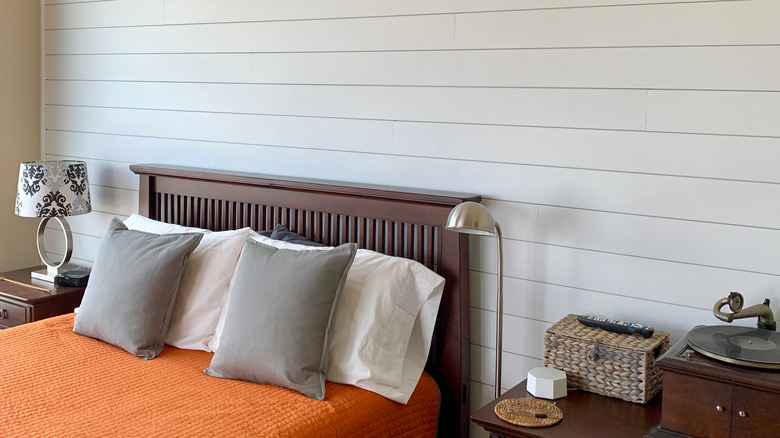 shiplap accent wall in bedroom