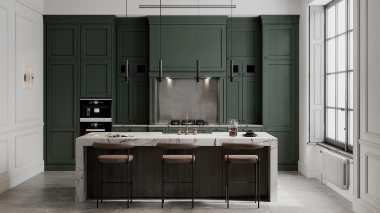 kitchen with dark green cabinets