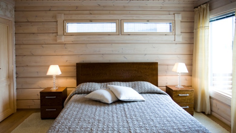 Bedroom with wood accent wall