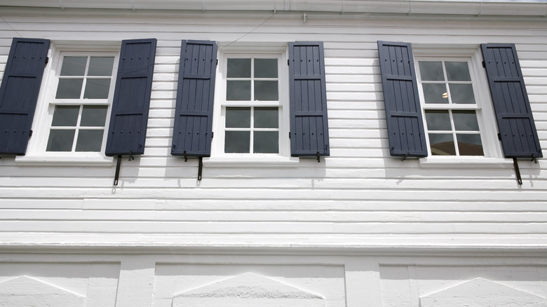 Painted navy window shutters