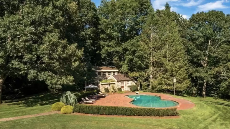 view of the pool by guest house