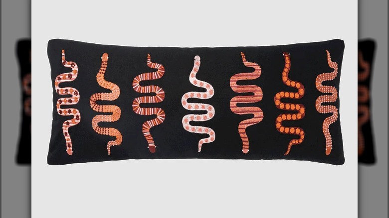 Embroidered snake pillow