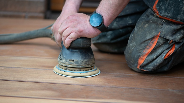 sanding wood floor to prep for stain