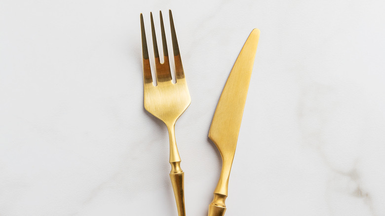 gold fork and knife