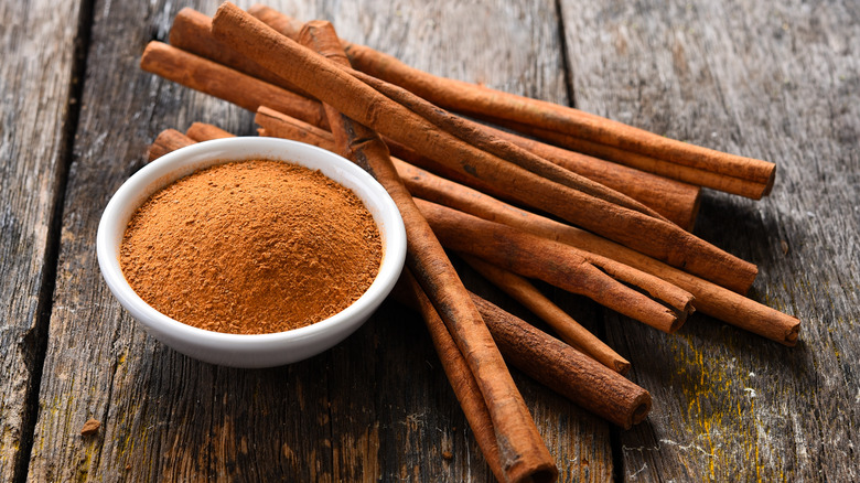 cinnamon and cinnamon sticks on counter