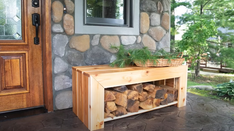 firewood storage bench with logs