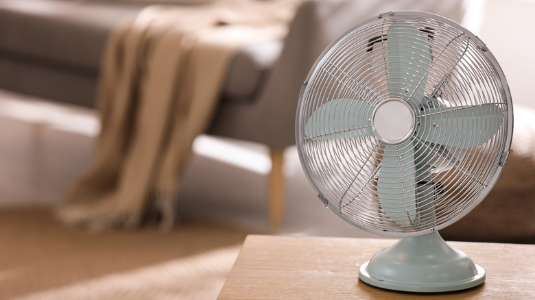 An electric fan on table