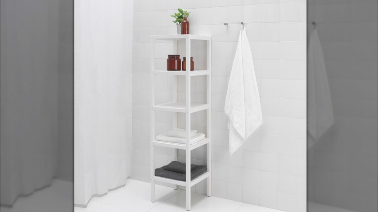 white thin shelving unit 