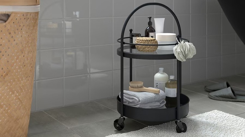 black bar cart in bathroom