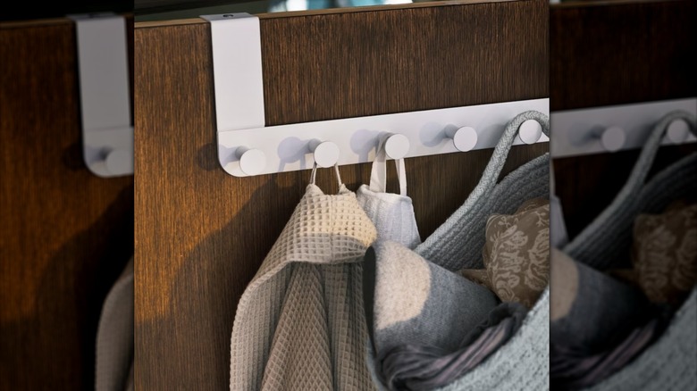 towel rack with hanging basket