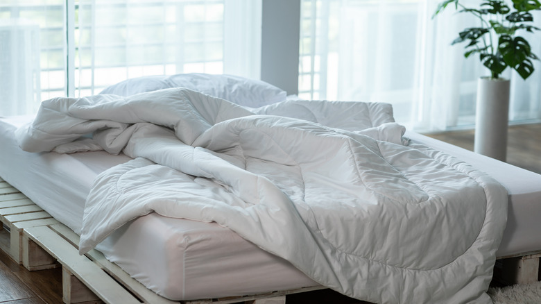 Thin white duvet