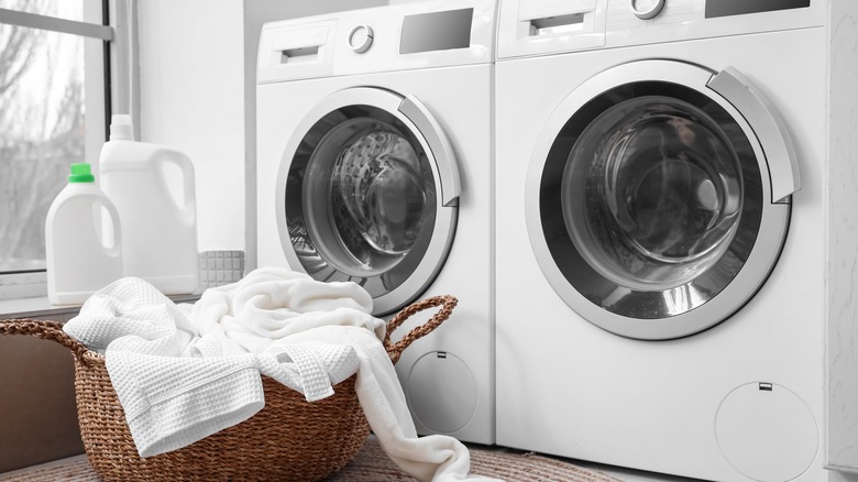 Laundry in front of washing machines