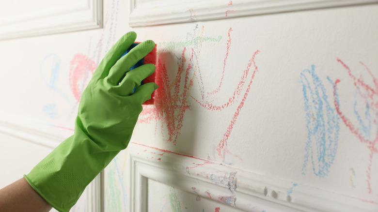 woman washing the wall