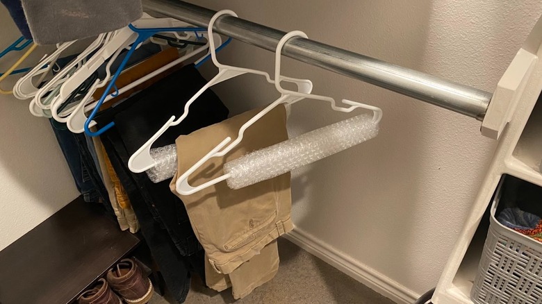 Pants hanging in closet