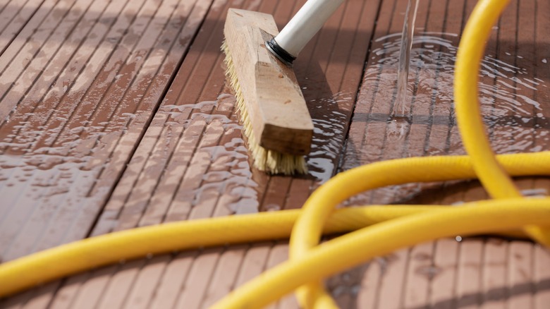 Cleaning wood deck with water