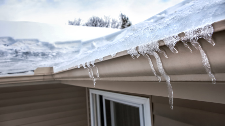 Gutters with a build-up of ice and snow