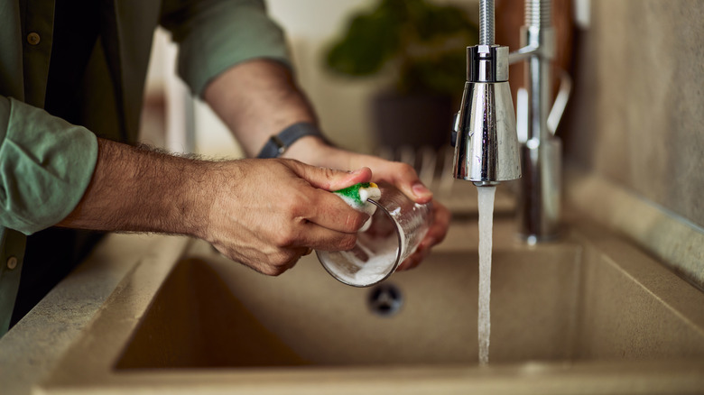 Person washing dishes