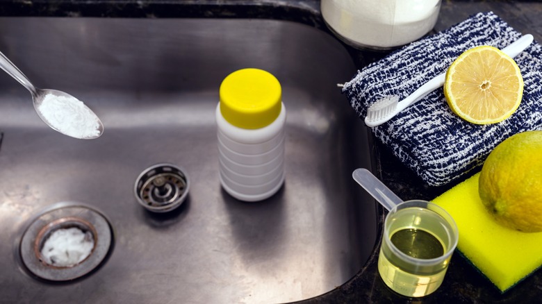 lemon juice and baking soda in sink