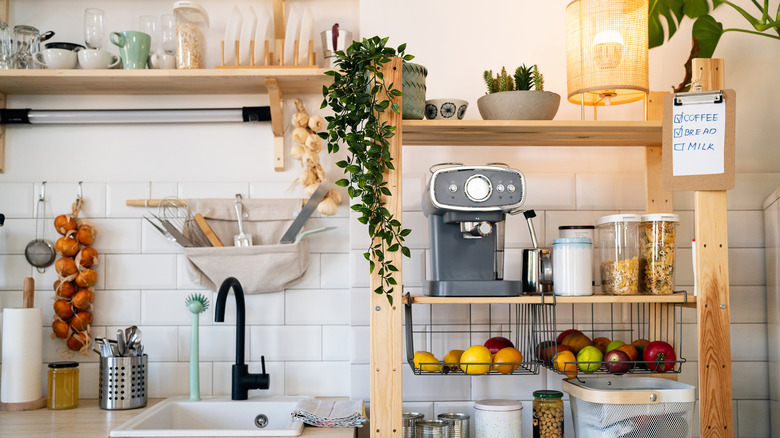 Kitchen items on wooden shelves