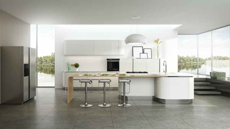 Modern, open white kitchen with island