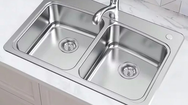 Stainless steel sink from Glacier Bay installed in a kitchen