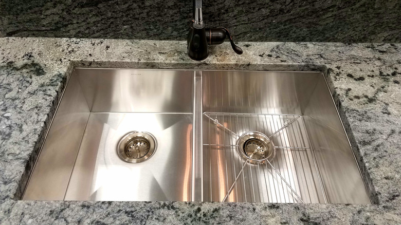 Kohler stainless steel sink installed in a kitchen