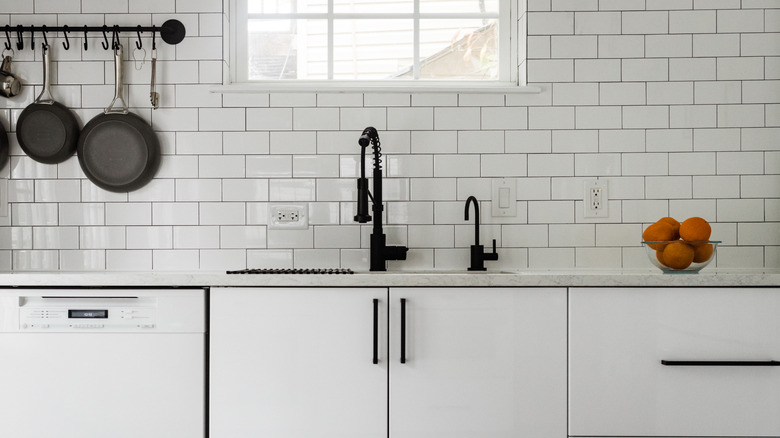 White subway tile backsplash in a kitchen