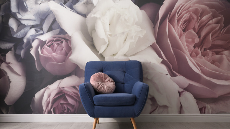 wall mural and blue chair