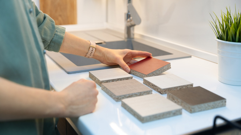 Person looking at countertop samples