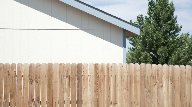 A picket fence with boards that look perfectly even