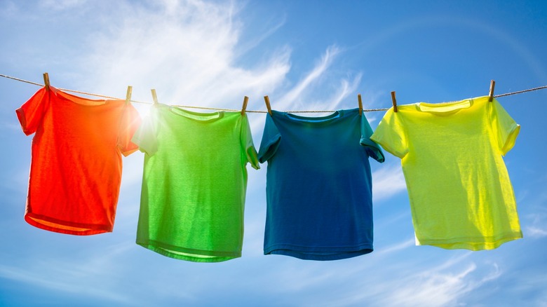 colorful shirts on outside clothesline