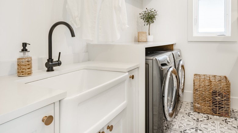 white ceramic laundry sink