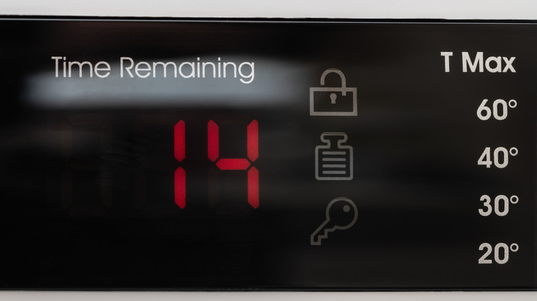 Washing machine displaying cycle time on the timer