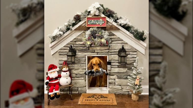 Stone doghouse with Christmas decorations