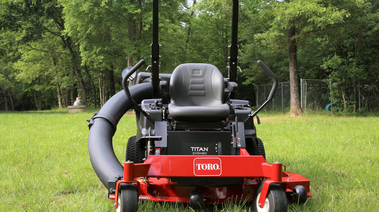 Toro zero-turn lawn mower parked in the yard