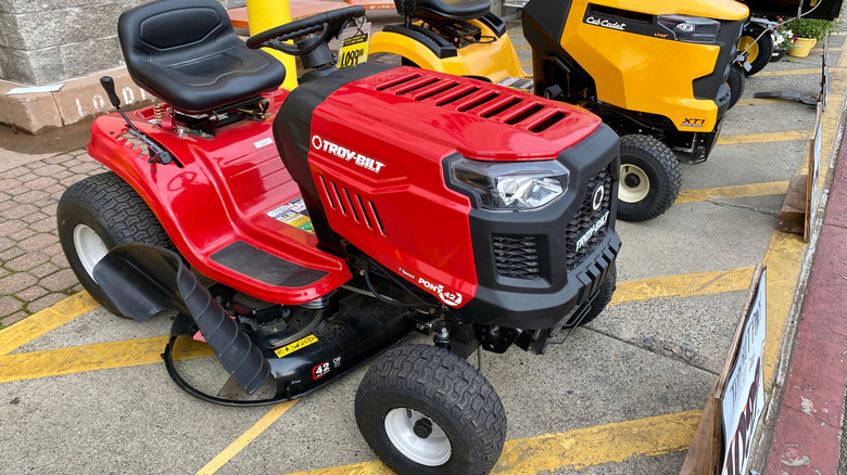 Troy-Bilt riding mower for sale outside a store